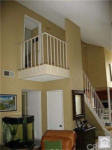 The stairway and landing overlooking the living ro