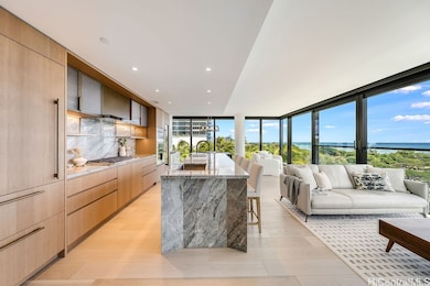 Grand living space with open kitchen to living to dining room flow.
