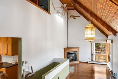 Interior space featuring wooden ceiling, a ceiling