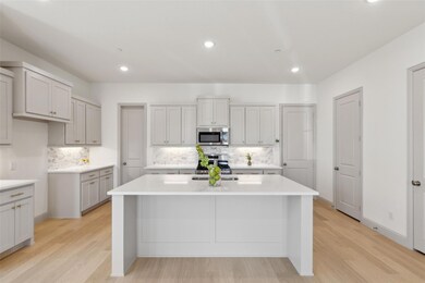 This dream kitchen is beautifully finished and off