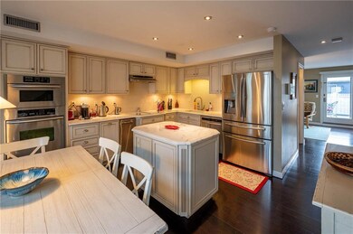 Center Island Kitchen with view into Living Room a