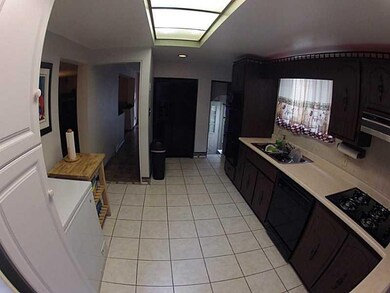 Kitchen. Ceramic tile floors.
