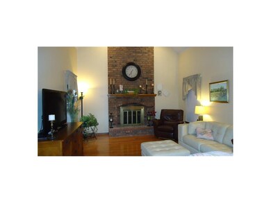 Great Room with Fireplace and Wood Floors