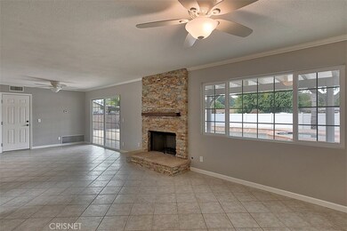 Family Room and Dining area, slider to backyard. Direct access to garage and laundry too!