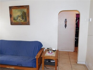 Tile flooring, rounded archways.