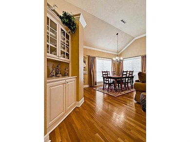 Dining Room. Built-ins act as a divider to the kit