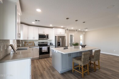 kitchen with two color cabinets