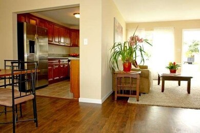 View of Living Room, Kitchen & Dining as you enter