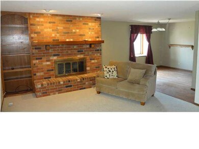LIVING ROOM HAS WOOD BURNING FIREPLACE & GAS START