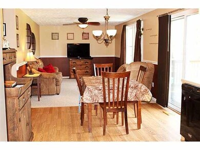 Family Room. The spacious eat in kitchen with slid