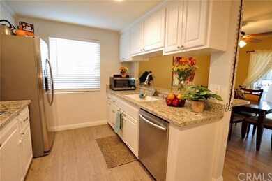 ONE MORE VIEW OF THE KITCHEN WITH SS APPLIANCES.