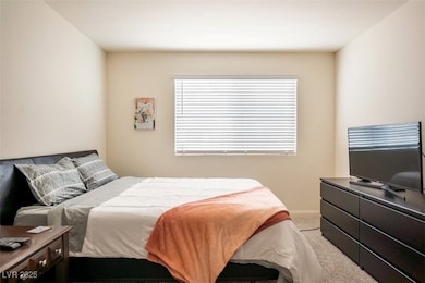 Bedroom down stairs featuring carpet floors