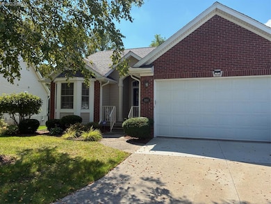 1151 Creekside Ct unit 32, Burton, MI 48509 - photo 2