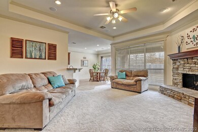 Spacious Living Room with New Carpet and Tray Ceil