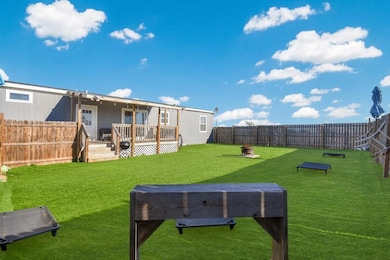 View of yard with a deck