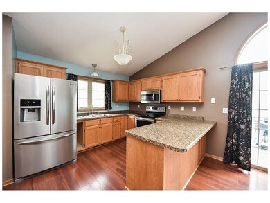 Main level kitchen features NEW countertops & NEW 