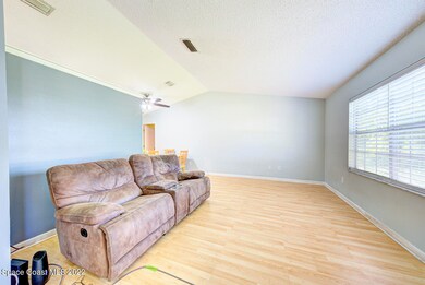 living room with vaulted ceiling