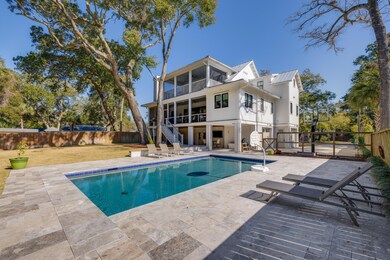 Pool accented with travertine decking
