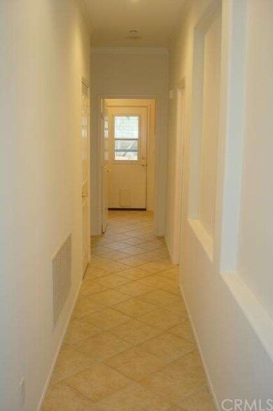 Downstairs Hallway Leads to Downstairs Bedroom, La