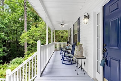 Porch featuring ceiling fan