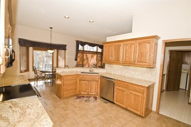 Updated kitchen with granite countertops, stone ba