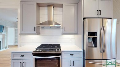 New stainless GE gas range and convection oven. So