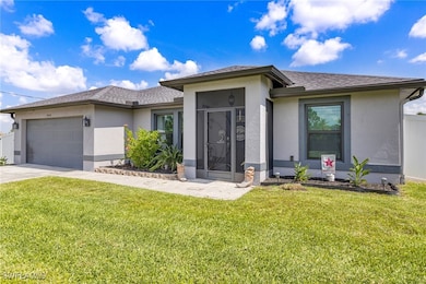 View of front of property featuring stucco siding,