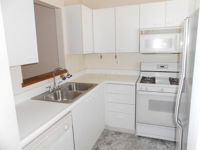 KITCHEN FULL OF APPLIANCES