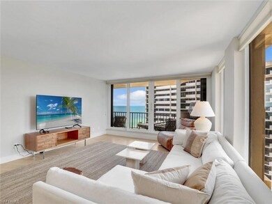 Living area featuring baseboards and wood finished floors