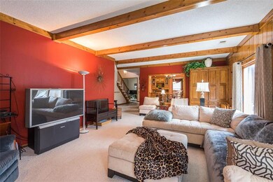 Family room, opens to front entry, breakfast room,