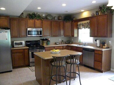 Large fully equipped kitchen with recessed lightin