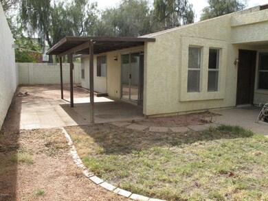 View from side courtyard toward backyard