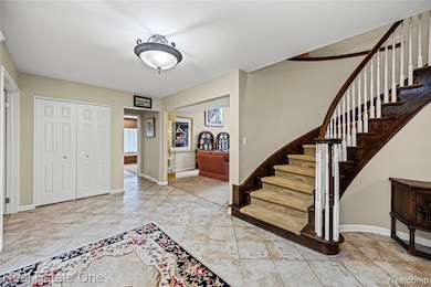 Entryway featuring  circular stairway