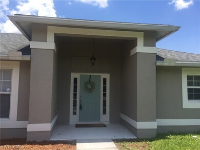 128 Ridgemont Dr, Lehigh Acres, FL 33972 - photo 2