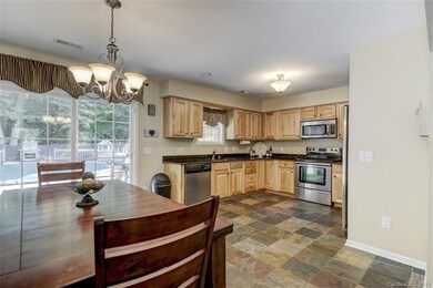Open concept kitchen and dining area are convenien