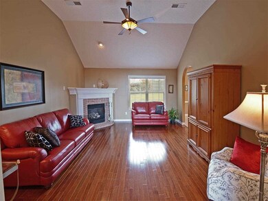 Vaulted great room is spacious with corner gas fir