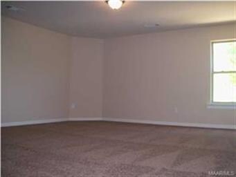 Upstairs has a large bonus room and a full bath