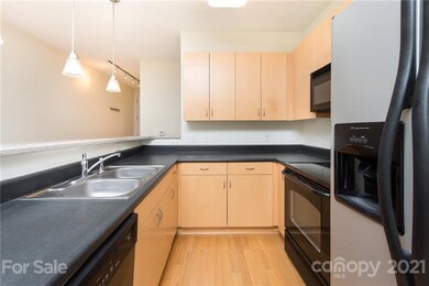 Modern kitchen and lighting - plenty of cabinet an