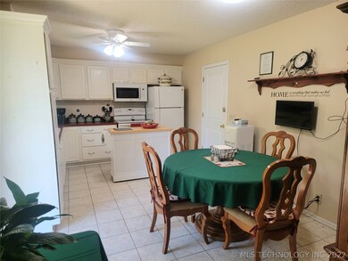 Eat in kitchen with access to back yard.