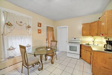 This kitchen is in the 1st floor apartment.