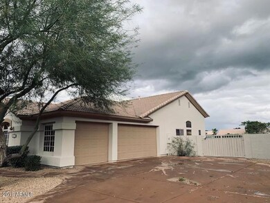 3 car garage and RV gate
