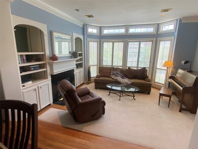 living room is south-facing w/ wood plantation shu