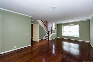 Great room with gleaming hardwoods