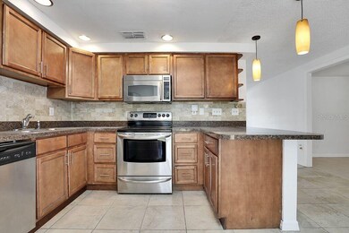 3609 Wisperbreath Ln, Tampa, FL 33619 - photo 6