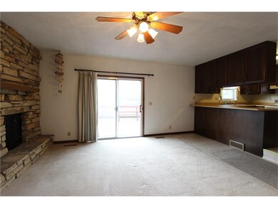 Family room opens to deck & backyard.