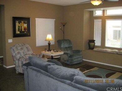 Bright family room with bench seat area under fron