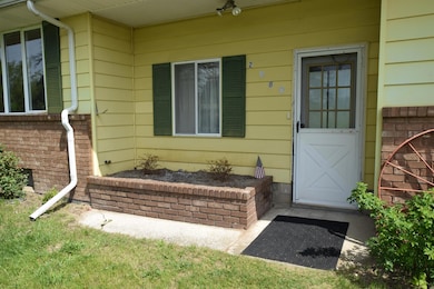 Welcoming you into the home is a built in planter. The perfect spot to plant bright flowers to give you a smile every time you pass.