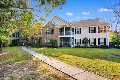View of front of property with a front lawn