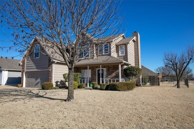 A covered front porch adorns the exterior of this