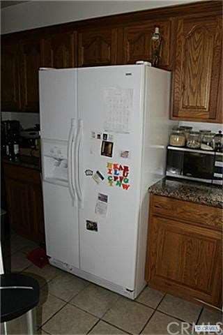 Refrigerator (side-by-side) is included with the l